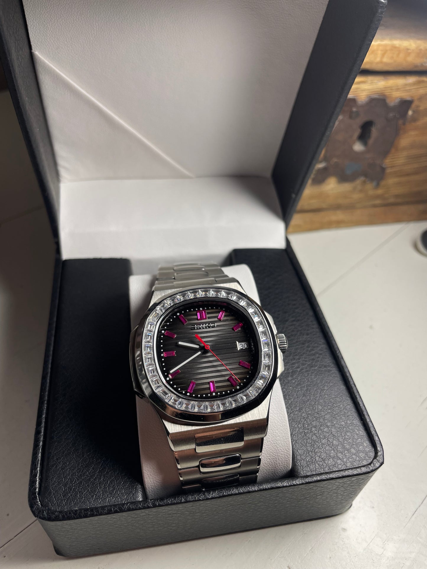 Silver Nautilus with white and pink stones